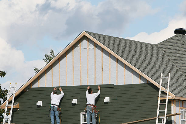 Professional Siding Installation technician working in Fayetteville, TN
